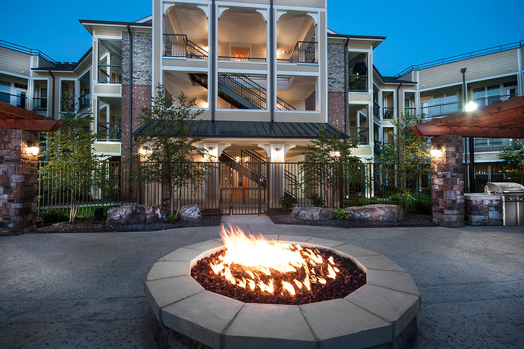 Humphreys Partners Architects Cantare at Indian Lake Fireplace Night
